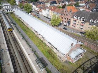 Prachtige goederenloods (voormalig NMBS gebouw) van 1304 m² met verschillende mogelijkheden tot ontwikkeling zoals kantoren, commercieel,...