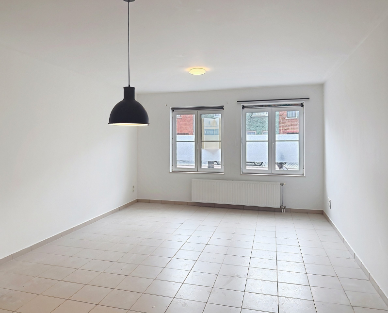 Gelijkvloers appartement met 2 slaapkamers en tuin - foto 2