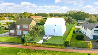 KNAPPE BOUWKAVEL (+-11A86CA) OP GROENE, DOCH CENTRALE EN GUNSTIGE LOCATIE, VLAKBIJ HET CENTRUM VAN BOCHOLT! Deze bouwkavel met maar liefst...