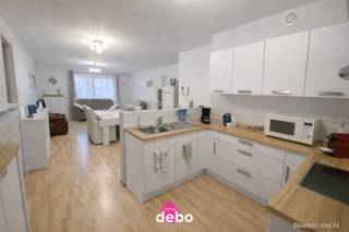 Volledig instapklaar ruim gelijkvloers appartement te Ingooigem (op 500m van Molecule) in een kleine residentie, omvattende o.a. : * Inkomhal *...