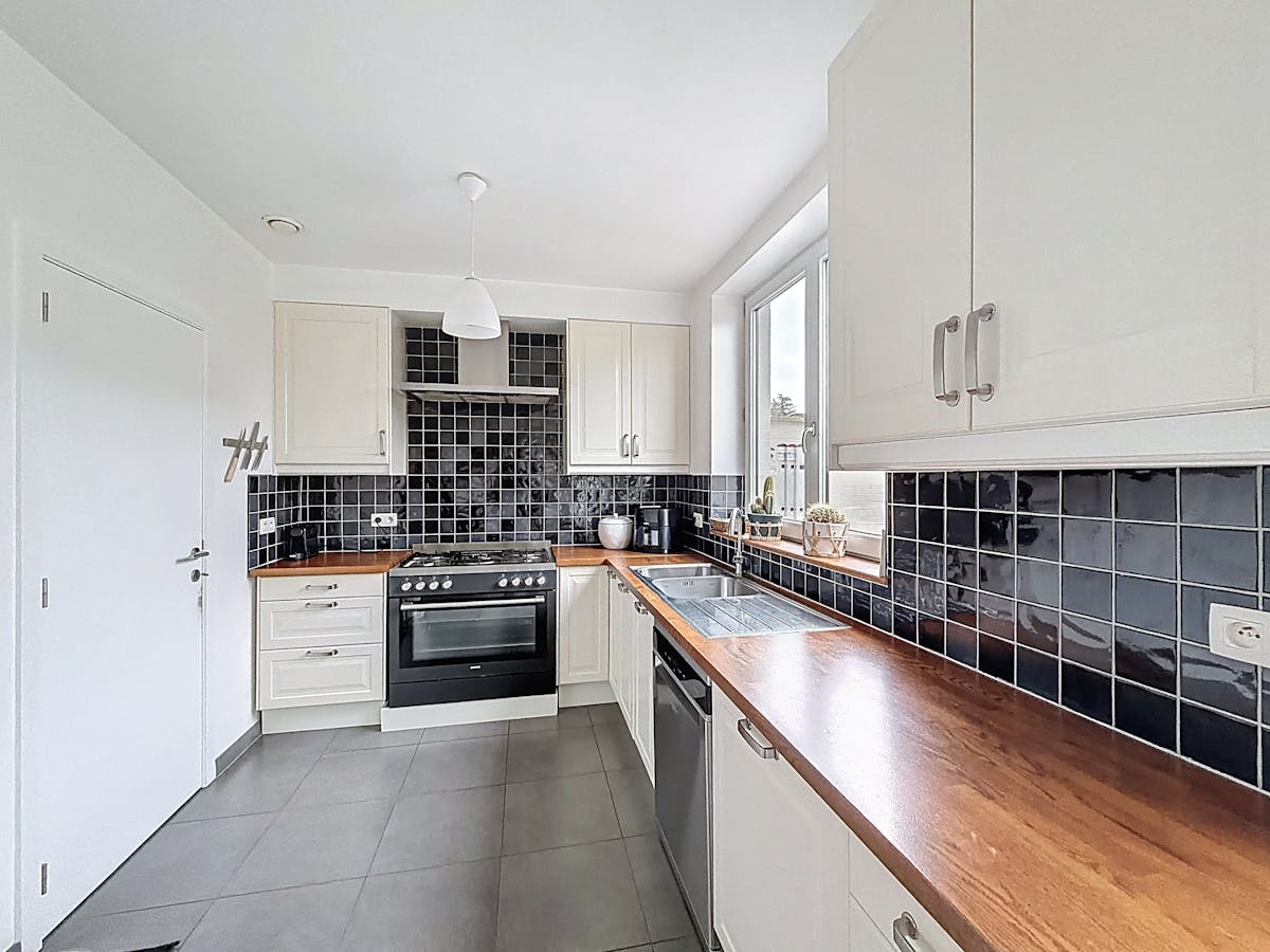 Karaktervolle woning met tuin in rustige wijk te Merelbeke - foto 4