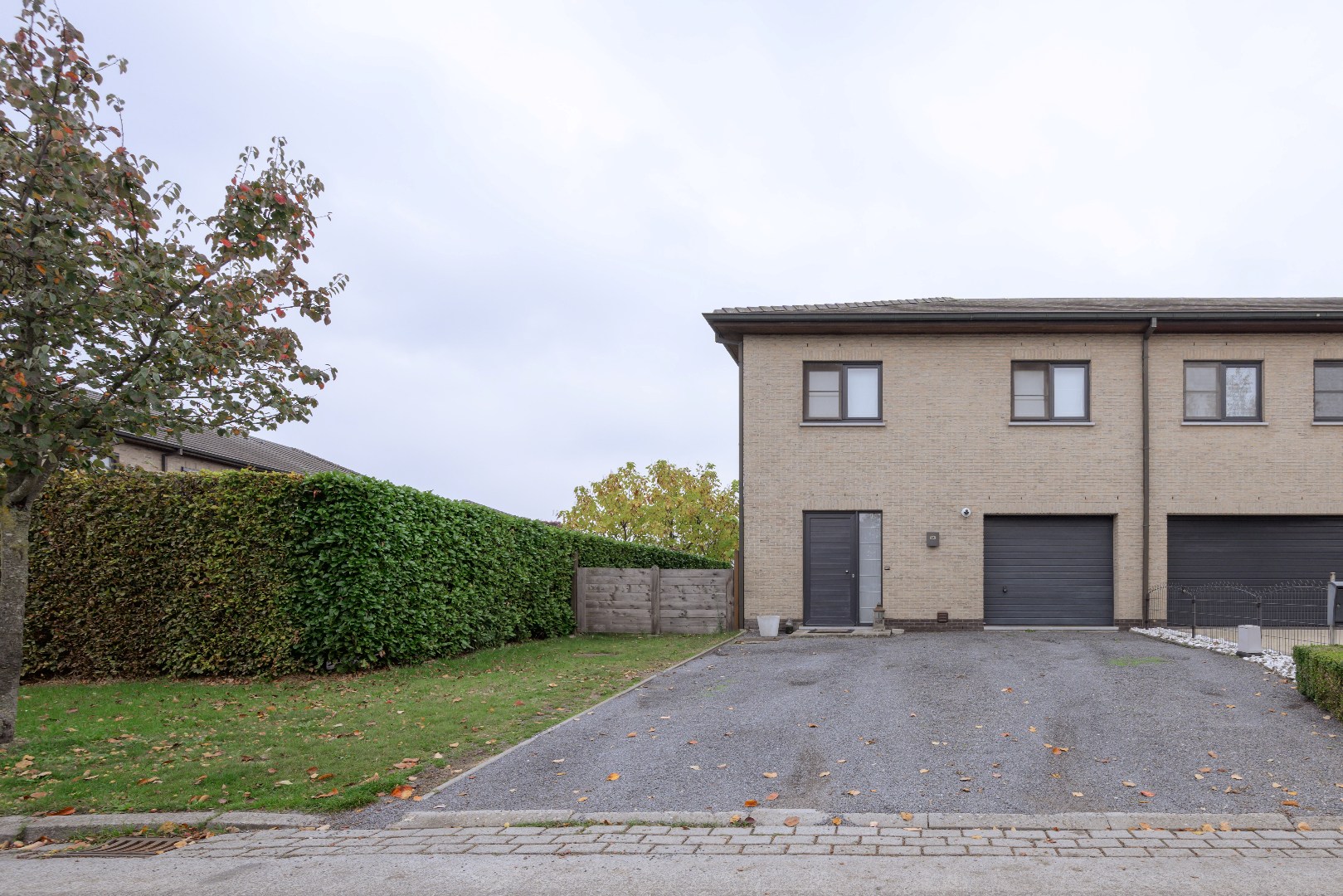 Ruime halfopen gezinswoning te Evergem - foto 1