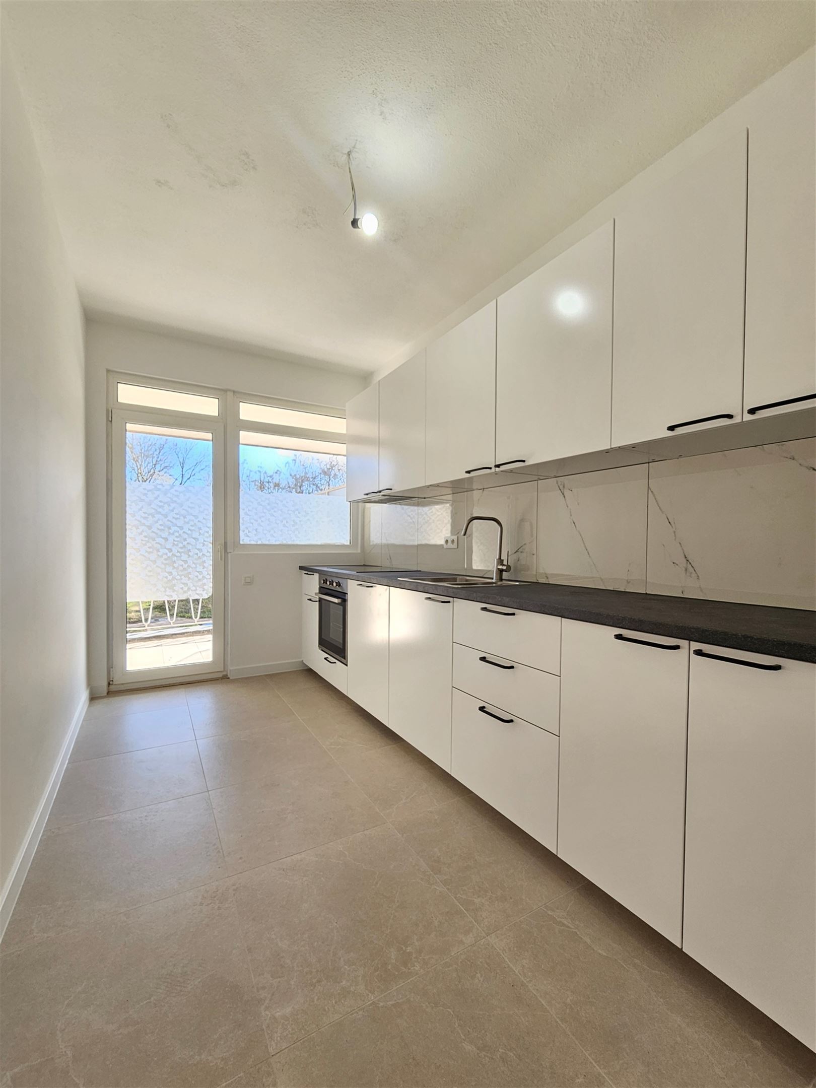 Centraal gelegen appartement met 2 terrassen. - foto 4