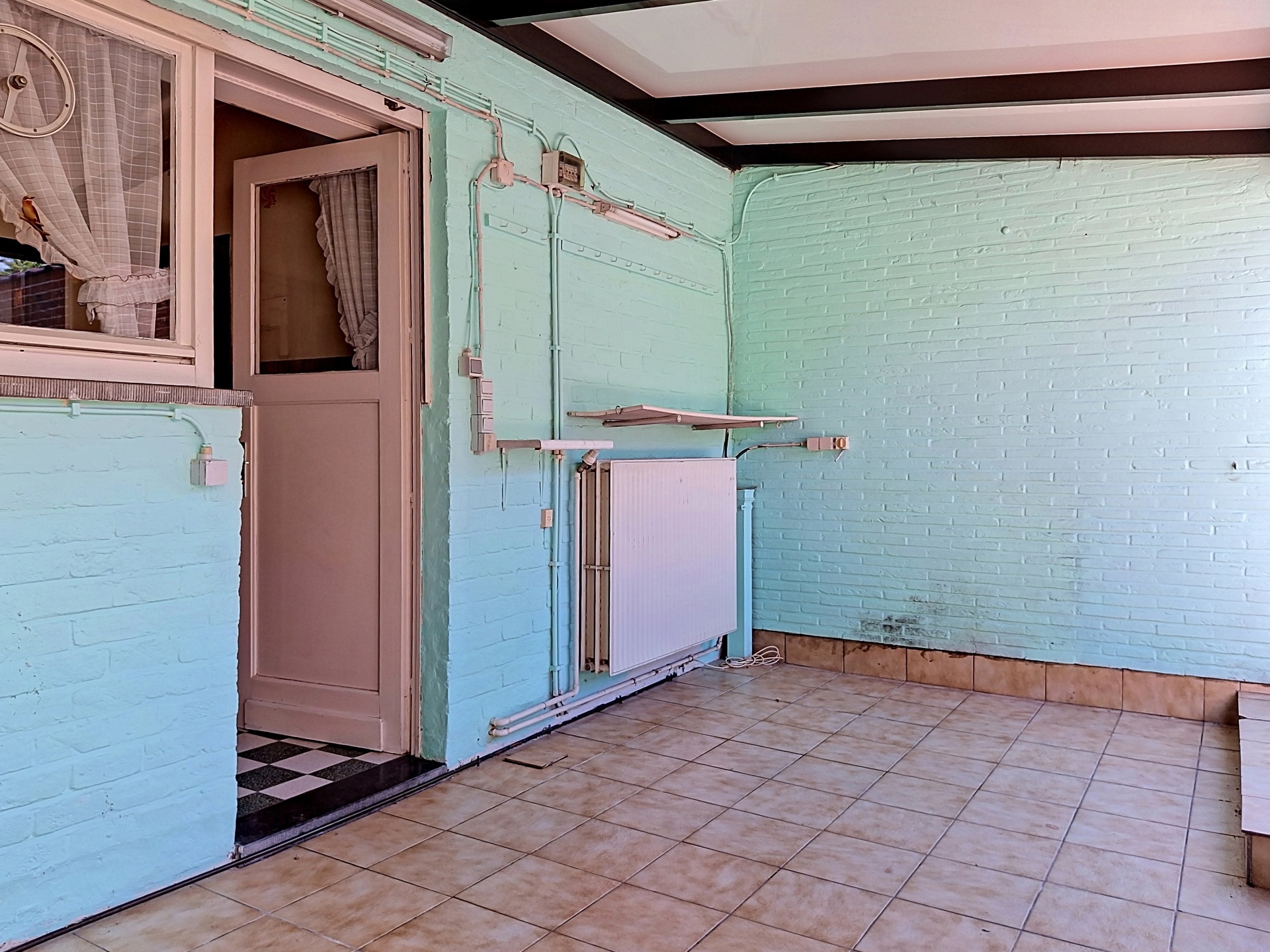 Karaktervolle halfopen woning met veel potentieel in Dilbeek - foto 5