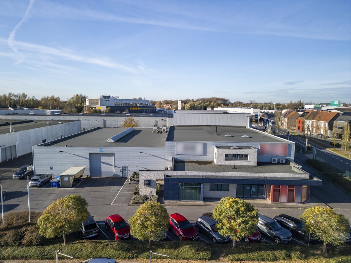 Société immobilière avec bâtiment commercial loué à vendre à Kuurne - photo 1