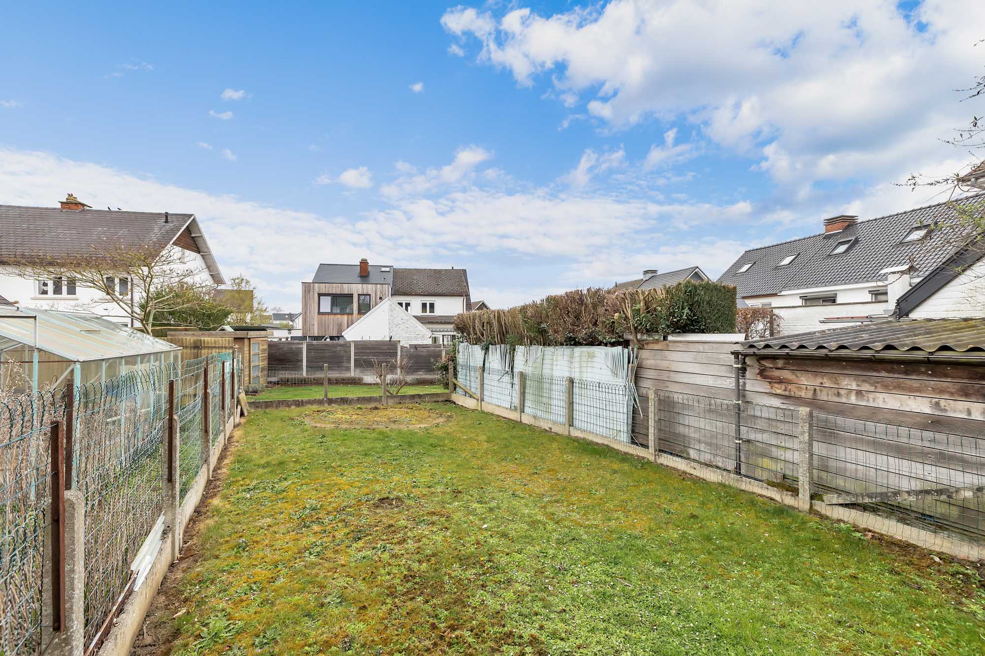 Halfopen bebouwing met garage en tuin in Ternat! - foto 4