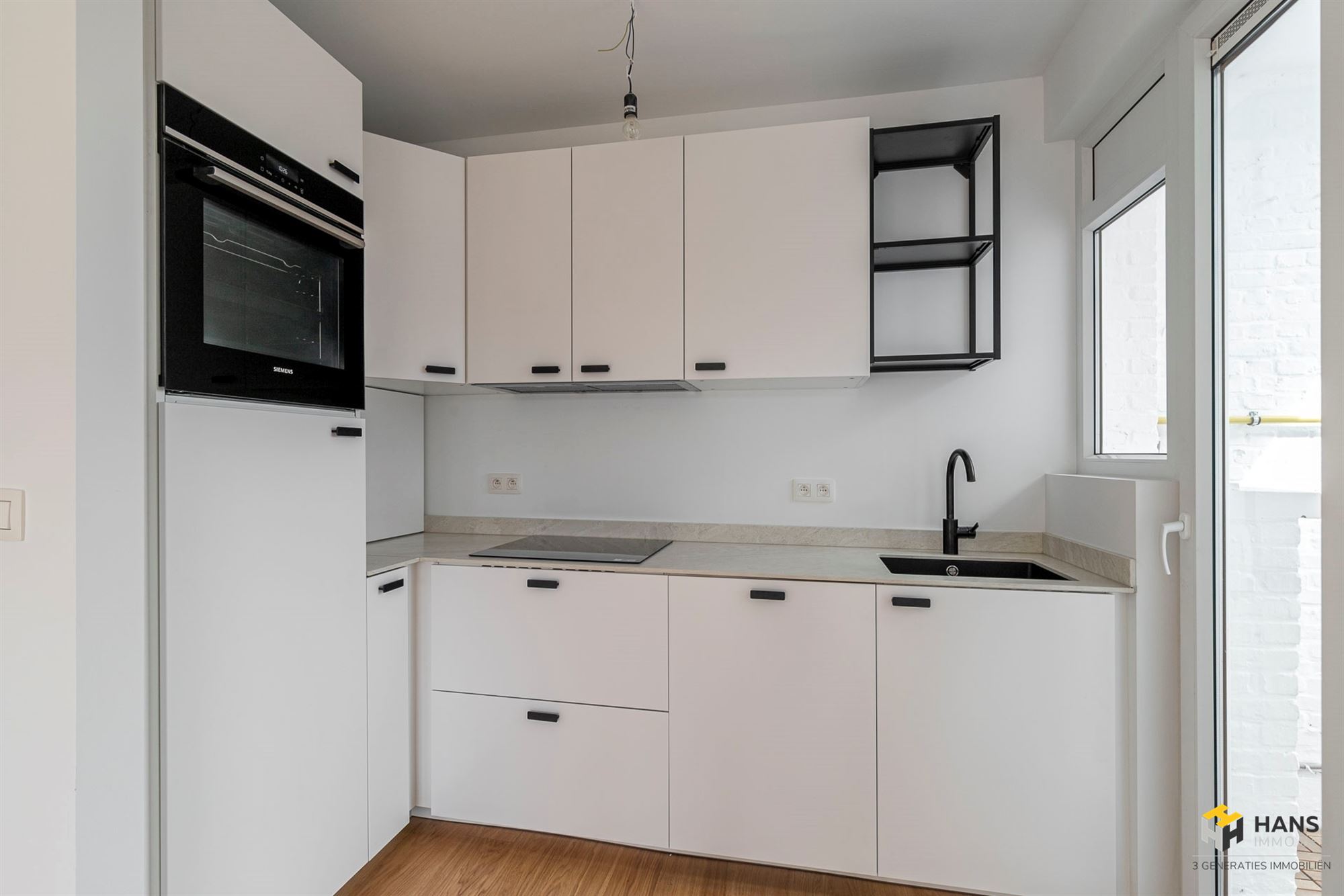 Gerenoveerd appartement (.60m²) met 2 slaapkamers en terras (3 m²) in Deurne. - foto 4