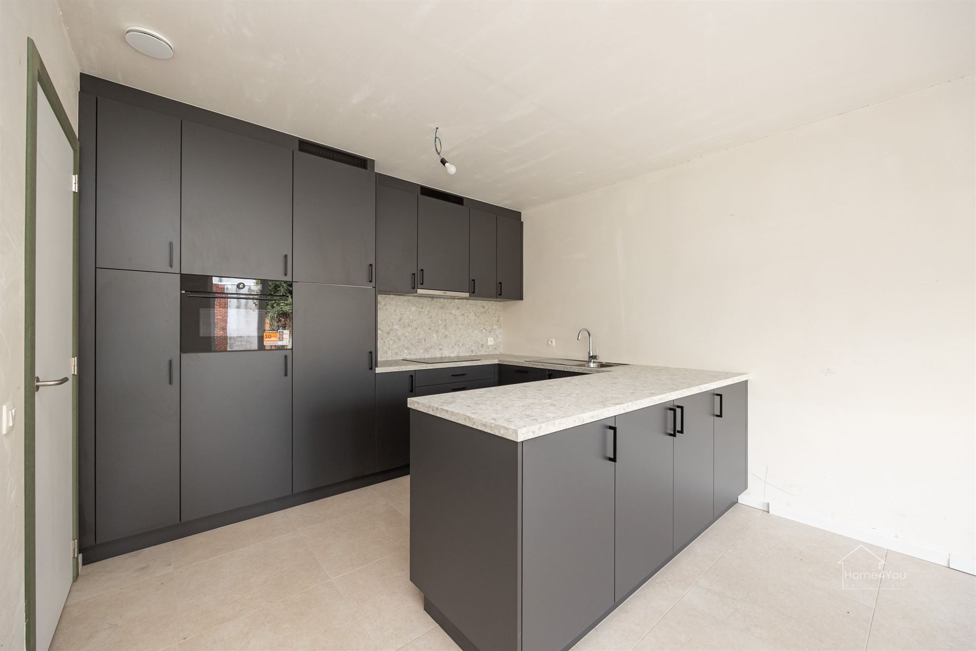 Nieuwbouw gelijkvloers appartement met aangename tuin - foto 5