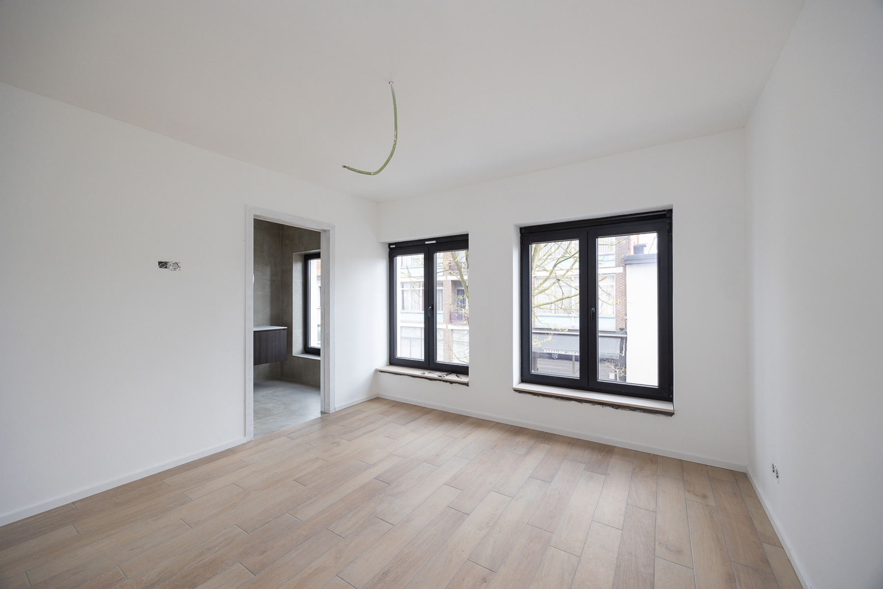 GELIJKVLOERS APPARTEMENT MET ZONNIGE TUIN - foto 5
