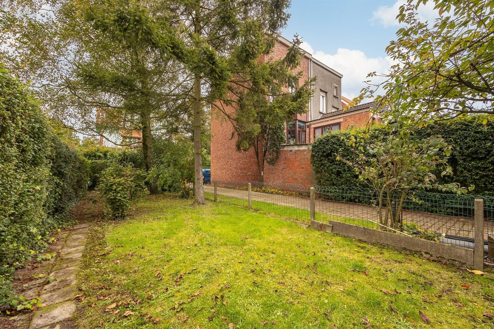 Halfopen bouwgrond in een rustige straat - foto 2