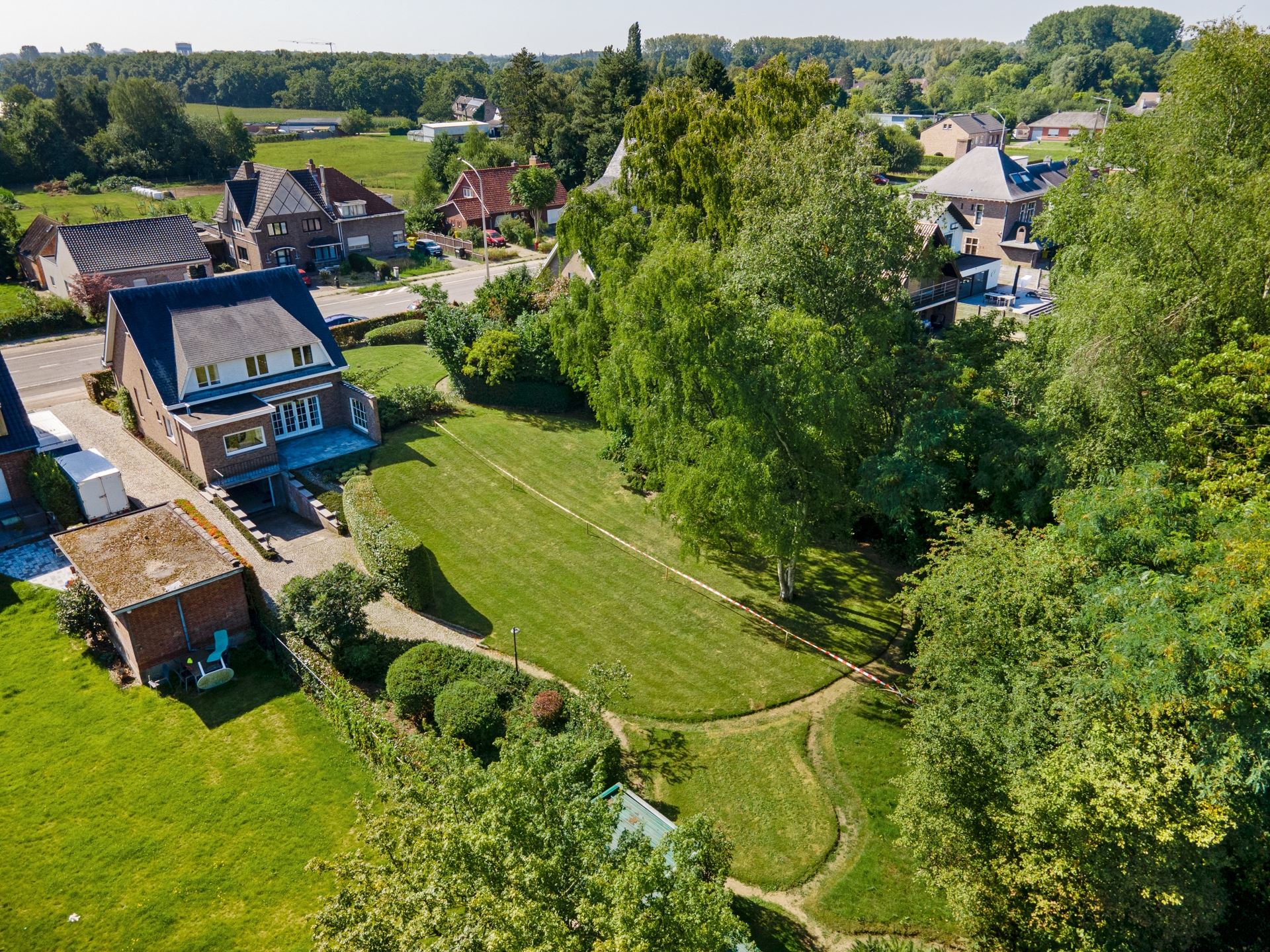 Bouwgrond voor open bebouwing – 937 m² met prachtig groen achteraan - foto 4