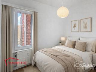 Licht appartement op wandelafstand van het Te Boelaarpark en diverse winkels.De inkomhal leidt naar de woon- en eetkamer (ca. 23 m²) met...