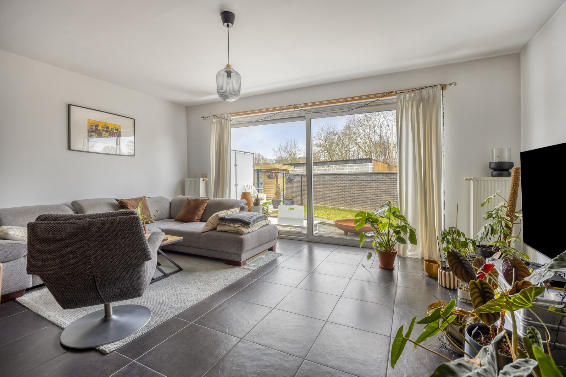 Gelijkvloers appartement met tuin en staanplaats - foto 3