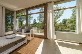 Uiterst lichtrijke woning te huur langs het Duinrandwandelpad in Oostduinkerke met zicht op de duinen vanuit leefruimte en keuken, zonnige tuin,...