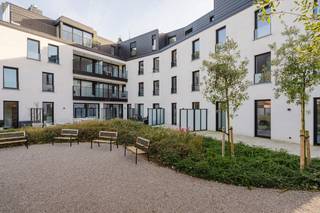 SINT-AMANDUS ZWEVEGEM Appartement 0.2 | 2 slaapkamers | 6% BTW mogelijkLuxueus wonen in het hart van Zwevegem. Residentie Sint-Amandus biedt modern...