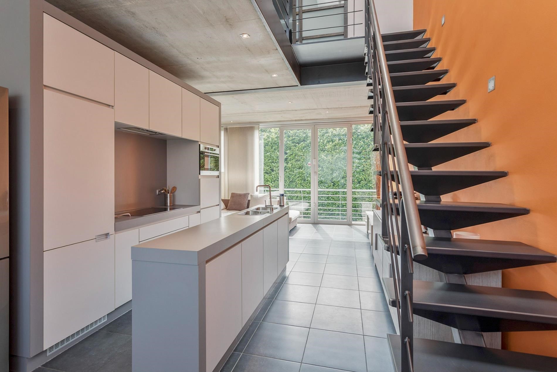 Dilbeek centrum: duplex appartement met 2 slaapkamers en tuintje - foto 4