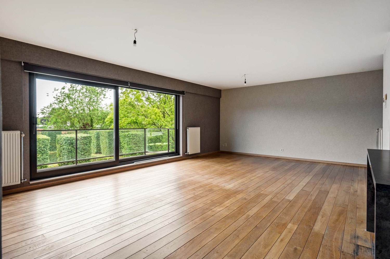 Ruim appartement met zonnig terras en garagebox op toplocatie in Wijnegem! - foto 3