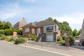 <h1><span>Charmingly situated renovation property on a 781 m² lot in the Flemish Ardennes</span></h1><p><span>In a beautiful location, on the slopes of the Wolvenberg, stands this characterful home on a 781 m² lot. A unique opportunity for anyone looking for a renovation project in a quiet, green setting.</span></p><p><span>The home features an entryway, a spacious and bright living area with an adjoining kitchen and dining area, two full-sized bedrooms, and a bathroom. A fixed staircase leads to the spacious attic, which offers numerous possibilities for creating additional bedrooms, a hobby room, or a home office.</span></p><p><span>In addition, the house has a full basement and a garage, providing extra storage space and practical convenience.</span></p><p><span>The garden, with its outbuildings, partially borders a nature reserve and offers a beautiful view of the surrounding countryside of the Flemish Ardennes. Here, you can enjoy peace, privacy, and a unique living environment.</span></p><p><span>Additional highlights:</span></p><ul><li><span>781 m² lot</span></li><li><span>Quiet, green location on the Wolvenberg</span></li><li><span>Full basement</span></li><li><span>Garage included</span></li><li><span>Fixed staircase to a spacious attic with potential for expansion</span></li><li><span>Oil-fired central heating (boiler installed in 2014)</span></li><li><span>Additional gas heater</span></li><li><span>Partially located in a nature reserve</span></li></ul><p><span>Are you looking for a home in an exceptional location that you can renovate entirely to your own taste? Then this property is definitely worth a visit.</span></p><p><span> </span></p><p><span>Schedule your appointment at jurgen@immodhondt.be</span></p>