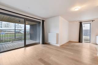 Gelijkvloers appartement met ruim overdekt terras, kelderberging en optionele staanplaats in LedebergIn de Jenny Tanghestraat 7 bus 001 te 9050...