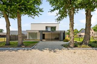 This modern and energy-efficient villa is located in a quiet and centrally located street in Lommel. This property dates from 2022 and is finished with high-quality materials. The villa includes a beautiful living space with a sitting area, dining area, and fitted kitchen, a multifunctional space, storage cellar, basement, 3 bedrooms, 2 bathrooms, 2 guest toilets, a swimming pool, and an attached carport for 2 cars.<br /><br />Ground floor:<br />You enter the house through the entrance hall with a separate toilet that directly overlooks the garden. The living room and kitchen are bathed in daylight through the large windows at the rear of the house. These spaces seamlessly connect but still feel cozy due to the thoughtful architecture.<br /><br />The modern kitchen is fully equipped with high-quality appliances and has plenty of cupboard space. Adjacent to the kitchen is a practical storage room that serves as the entrance to the carport.<br /><br />First floor:<br />The master bedroom consists of a spacious bedroom overlooking the garden. Opposite is the impressive bathroom with a walk-in shower, double sink, and freestanding bath. There are also 2 additional bedrooms, currently used as a dressing room and laundry room. The toilet is provided separately.<br /><br />Basement:<br />On the lower floor, we find the multifunctional space for a hobby room, sports room, office, or additional bedroom. Adjacent is the second bathroom with a sauna, sink, and walk-in shower. There is also a storage room and cellar. The basement area is also accessible through an outside door.<br /><br />Garden:<br />The garden is completely fenced and equipped with a beautiful swimming pool. At the front of the house, there is a carport for parking 2 cars.<br /><br />Extraordinary features:<br />- Underfloor heating<br />- Swimming pool<br />- Multifunctional space<br />- Air conditioning<br />- Carport for 2 cars