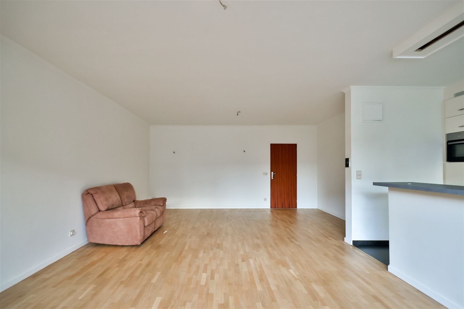 Ruim gelijkvloers appartement (105m²) met tuin en garagebox - foto 4