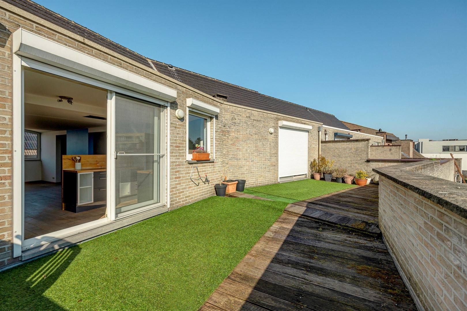 Ruim duplexappartement 120m² met groot terras 40m²  - foto 1