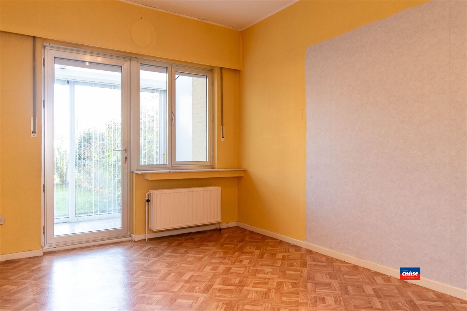 Gelijkvloersapp. met 2 slpks, tuin + garage - foto 5