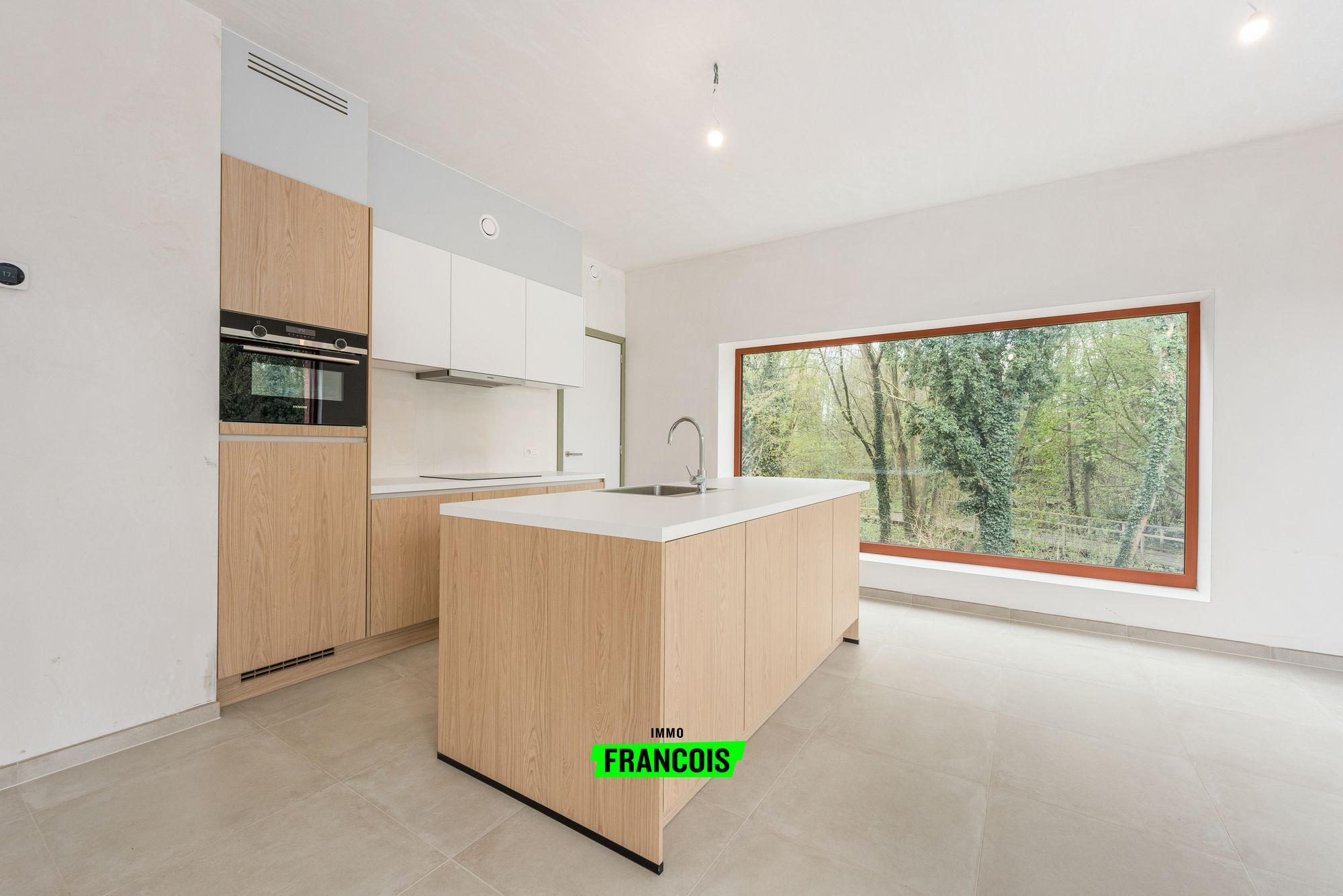 Nieuwbouwwoning met zicht op het Eilandbos in Sint-Lievens-Houtem - foto 1