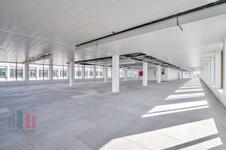 This 1905 sqm office space is located on the second and third floor and is part of the high-quality ‘Atmos’ office complex, consisting of five BREEAM OUTSTANDING-certified buildings. These offices are ready to move in and are located in a green environment with a car-free courtyard. Thanks to the attention to architecture and functionality, these sustainable offices are the ideal environment for innovation and collaboration in Ghent. The offices are future-oriented and comply with upcoming strict European regulations, such as the EU taxonomy. The complex offers ample underground parking facilities, including charging stations, and a public car park under construction, with completion scheduled for January 2025.<br /><br />The building is strategically located on the R4 ring road around Ghent, just 4 minutes' drive from the E40 on-ramp and exit Sint-Denijs-Westrem and 7 minutes from the E17. Sint-Pieters station is 1.6 km away, which is an 8-minute bike ride or a 22-minute walk. In addition, a tram stop is just 900 metres away. The office building also offers excellent visibility from the R4, contributing to its prominent location.<br />Purchase of the offices is also possible.<br /><br /><br />For more information, the specifications or a no-obligation site visit, please contact PANORAMA B2B GENT KANTOREN on 09 225 09 02.