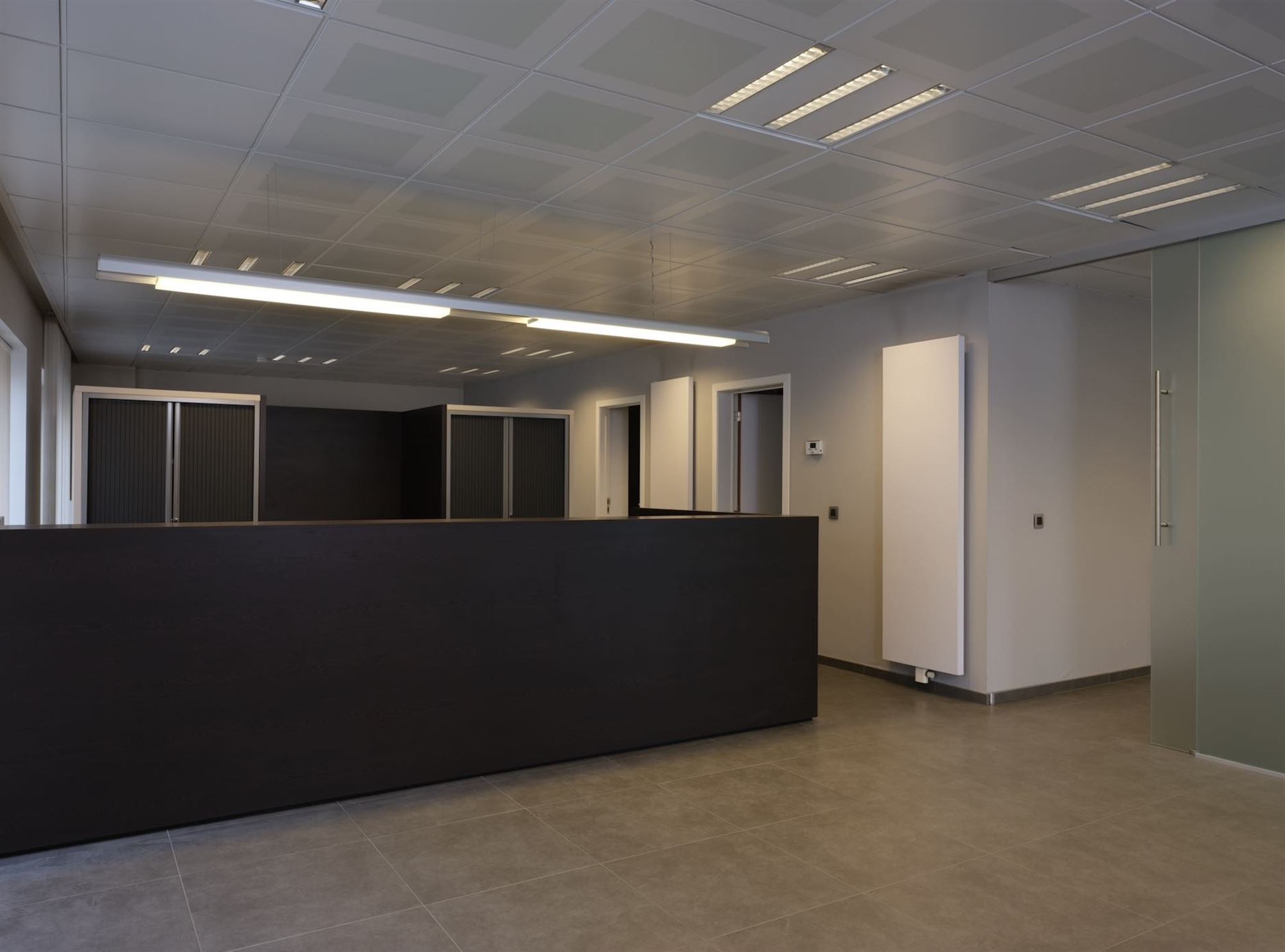 Centraal gelegen gelijkvloerse kantoorruimte - foto 4