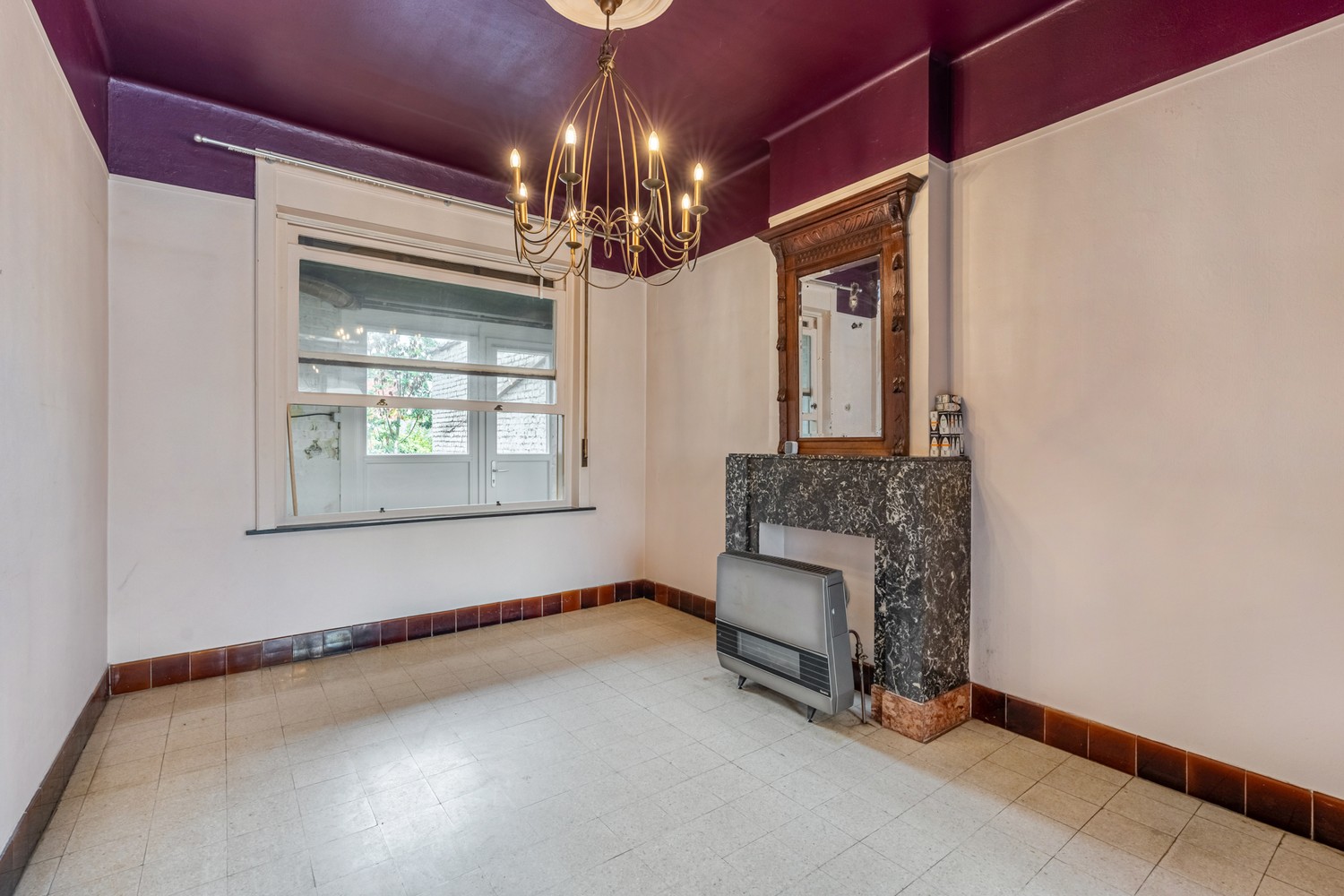 Karaktervolle stadswoning met tuin en renovatiepotentieel - foto 4