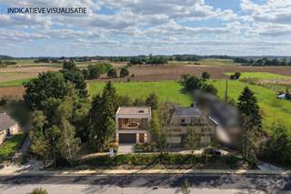 <p>In een bijzonder rustige en groene omgeving in Holsbeek, omringd door open landschap en weidse zichten, bieden wij deze bouwgrond aan voor open bebouwing op een perceel van <strong>7</strong><strong> are 50 centiare (lot 2)</strong>. Dit perceel is ideaal voor wie een <strong>droomwoning op maat</strong> wil creëren op een plek waar de omgeving mee bepaalt hoe je leeft: rustig, ruimtelijk, groen en met een blijvend gevoel van vrijheid.<br /><br />De vorm, ligging en sfeer van dit perceel nodigen uit tot het ontwerpen van een woning die volledig aansluit bij jouw eigen stijl en wensen. Van een moderne architectuur tot een gezellige landelijke woning: alles is mogelijk, zolang het past binnen jouw persoonlijke visie op comfortabel en kwalitatief wonen. De verkaveling zorgt daarbij voor een mooi geheel, terwijl jij alle ruimte krijgt om je eigen toets te zetten op je toekomstige thuis.<br /><br />Met zijn open uitzichten en de natuurlijke charme van de omgeving is dit lot een uitzonderlijke kans voor wie op zoek is naar een pure en rustige woonplek waar het leven vanzelf vertraagt. Hier bouw je niet zomaar een huis, maar een plek om jarenlang van te genieten.<br /><br />Al de weergegeven visualisaties en aanduidingen zijn indicatief en informatief, onder voorbehoud van het verkrijgen van een omgevingsvergunning. <br /><br />Benieuwd wat er allemaal kan en hoe jouw woonideeën hier werkelijkheid kunnen worden? <strong>Contacteer ons gerust — we nemen graag de tijd om je alle mogelijkheden toe te lichten en samen naar jouw ideale woning te kijken.</strong></p>