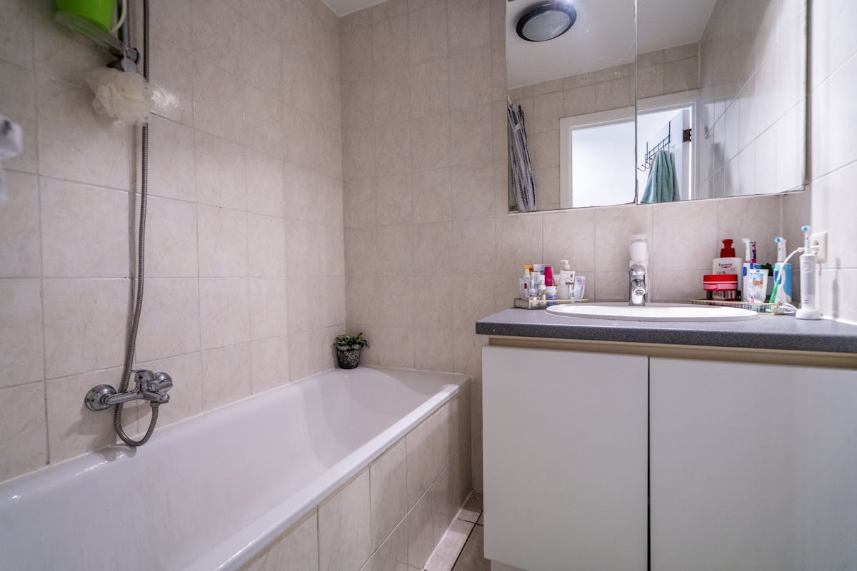 Centraal gelegen kangoeroewoning met twee aparte woonunits te Kortrijk - foto 5