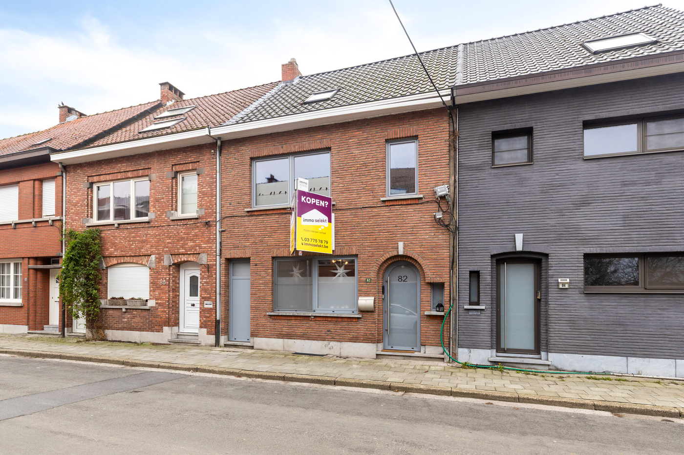 Instapklare gezinswoning met 3 slaapkamers, fietsenberging en tuin in Kruibeke - foto 2