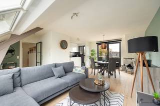 <p><span>Modern, stylish rooftop apartment with spacious terrace and panoramic views</span></p><p><span>Discover this stylish rooftop apartment on the second floor, where comfort meets modern living pleasure. The spacious sun terrace offers stunning, unobstructed views ideal for relaxing or hosting friends.</span></p><p><span>Inside you will enjoy a light-filled living space with warm wooden floors, Velux windows fitted with blinds and timeless finishes. The house features two bedrooms (12 m² and 11 m² with mezzanine), perfect for a family, a home office or guest room. The bathroom is equipped with a bathtub for extra comfort there is a separate toilet.</span></p><p><span>A modern heat pump with air conditioning ensures a pleasant indoor climate all year round. Velux blinds also provide optimal light management and additional living comfort. The apartment is extremely well maintained and ready to move into.</span></p><p><span>Parking space included.</span></p><p><span> </span></p><p><span>Are you interested in this beautiful apartment? Contact us soon for a visit!</span></p>