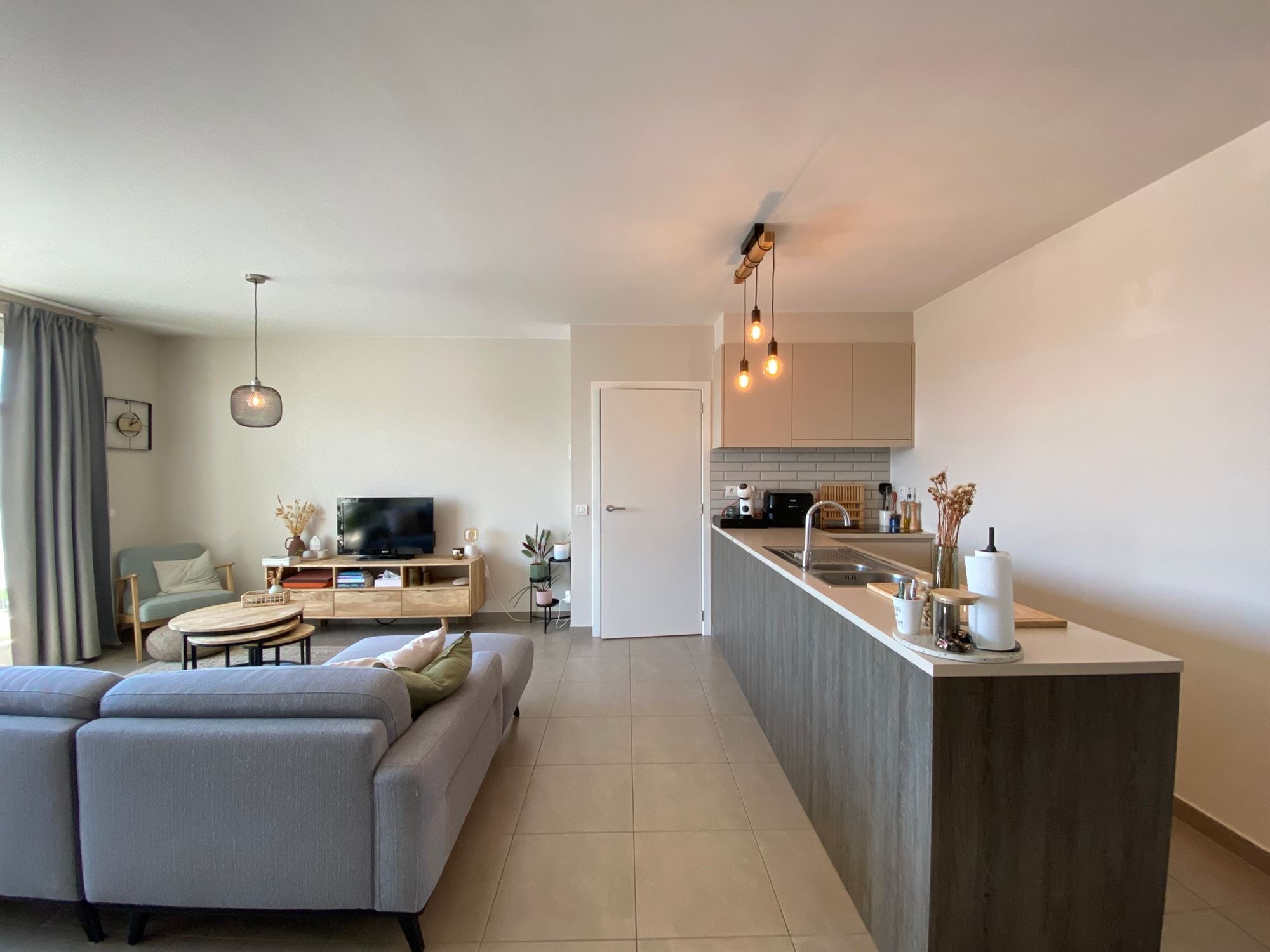 Prachtig energiezuinig dakappartement met 2 slaapkamers, ruim zonovergoten terras en garage in hartje Ertvelde - foto 4