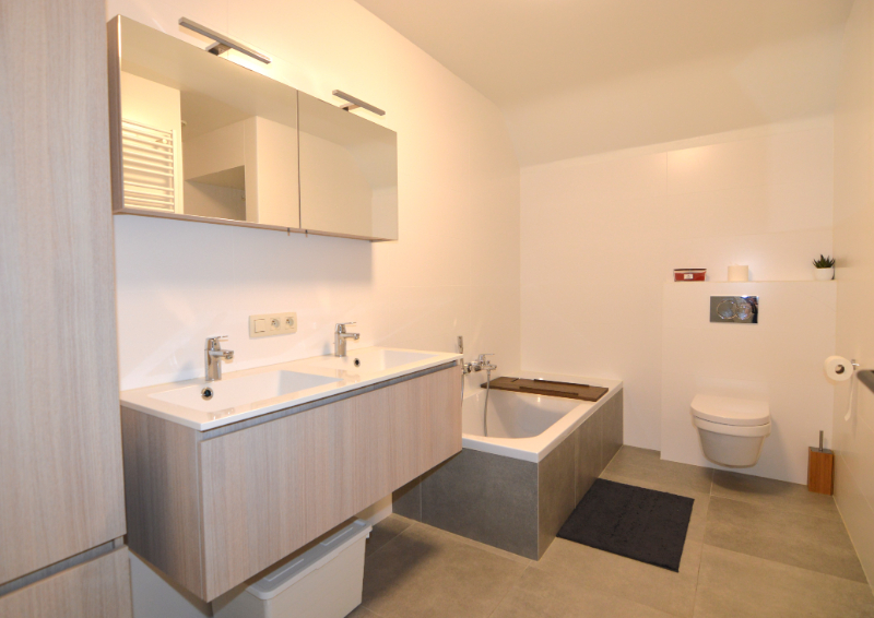 Appartement met 2 slaapkamers, terras en autostaanplaats te Boortmeerbeek. - foto 4