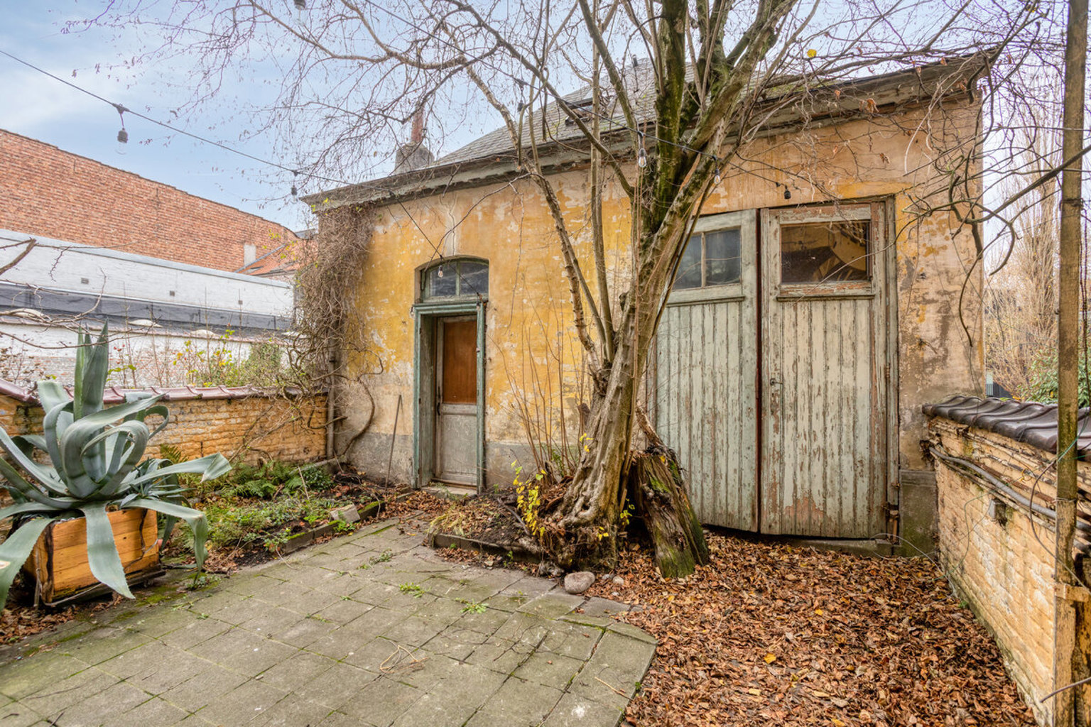 Commercieel gelijkvloers met achterliggend werkplaats - foto 5