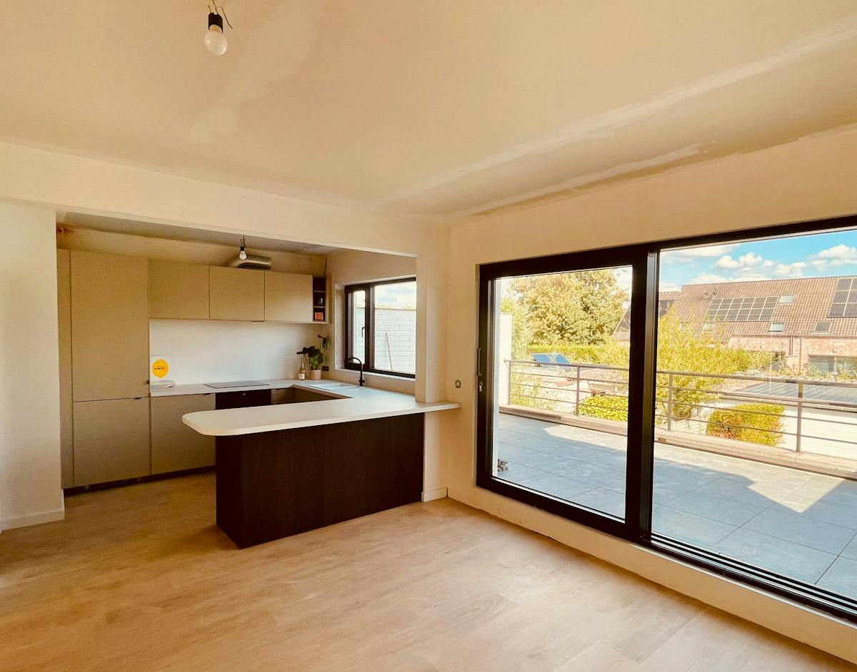 Vernieuwbouwappartement met 3 slaapkamers en garage - foto 1