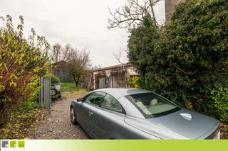 CENTRAAL GELEGEN WONING OP 9A 84CA MET EEN VERGUND MAGAZIJN VAN 215M², ZONNEPANELEN, CENTRALE VERWARMING, 3 SLAAPKAMERS EN EEN GEÏSOLEERDE...