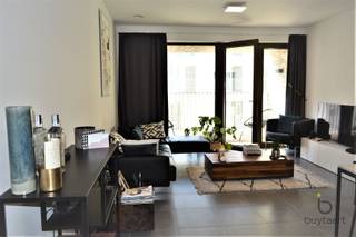 Energiezuinig appartement te huur op het Eilandje, met twee slaapkamers (12 m² + 8.5 m²) en een Zuidgericht terras (3m²) .Het appartement is volledig...