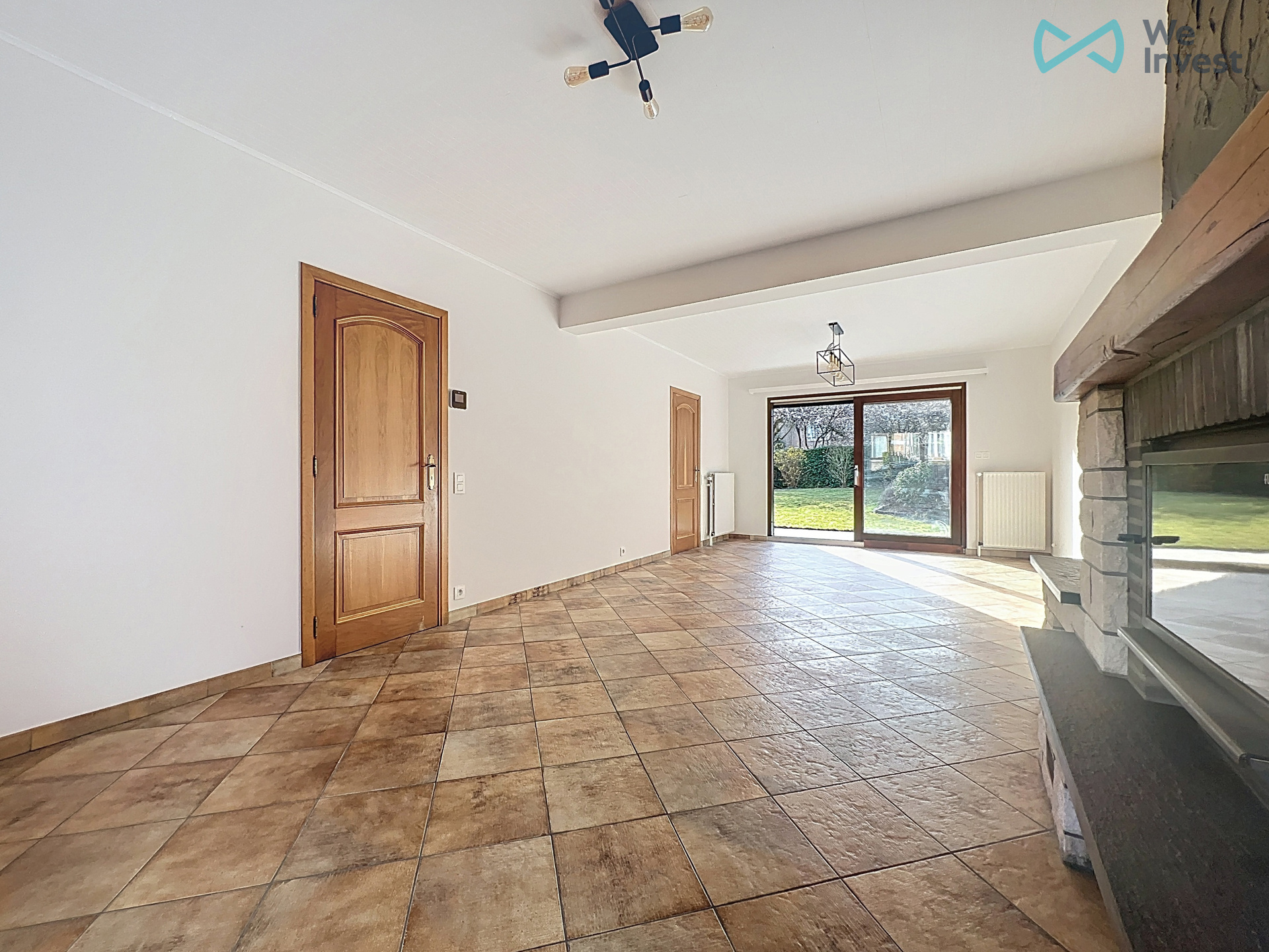 Tweegezinswoning met verhuurd appart, dubbele garage en tuin - foto 5