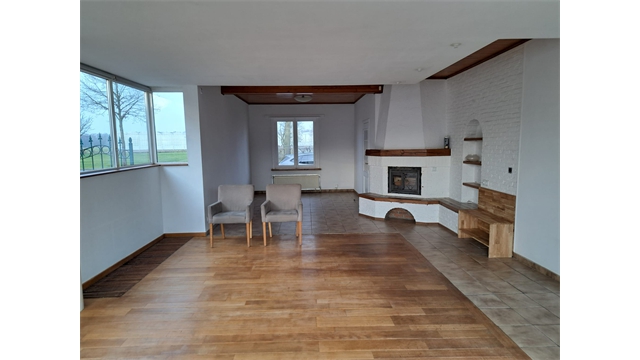 Een ruime woning met winkelruimte, achterliggende opslagruimte en tuin - foto 3