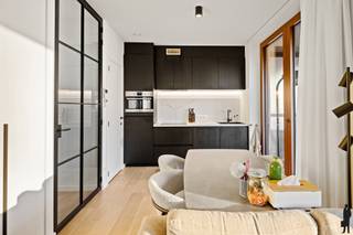 -- Verkoop mogelijk onder 2% registratierechten! --Prachtig afgewerkt, instapklaar appartement in de Jos Smolderenstraat, gelegen op het Nieuw Zuid...