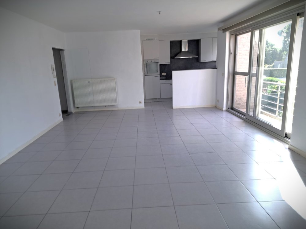 Een centraal gelegen appartement op de eerste verdieping met ondergrondse parkeerplaats en lift - foto 3