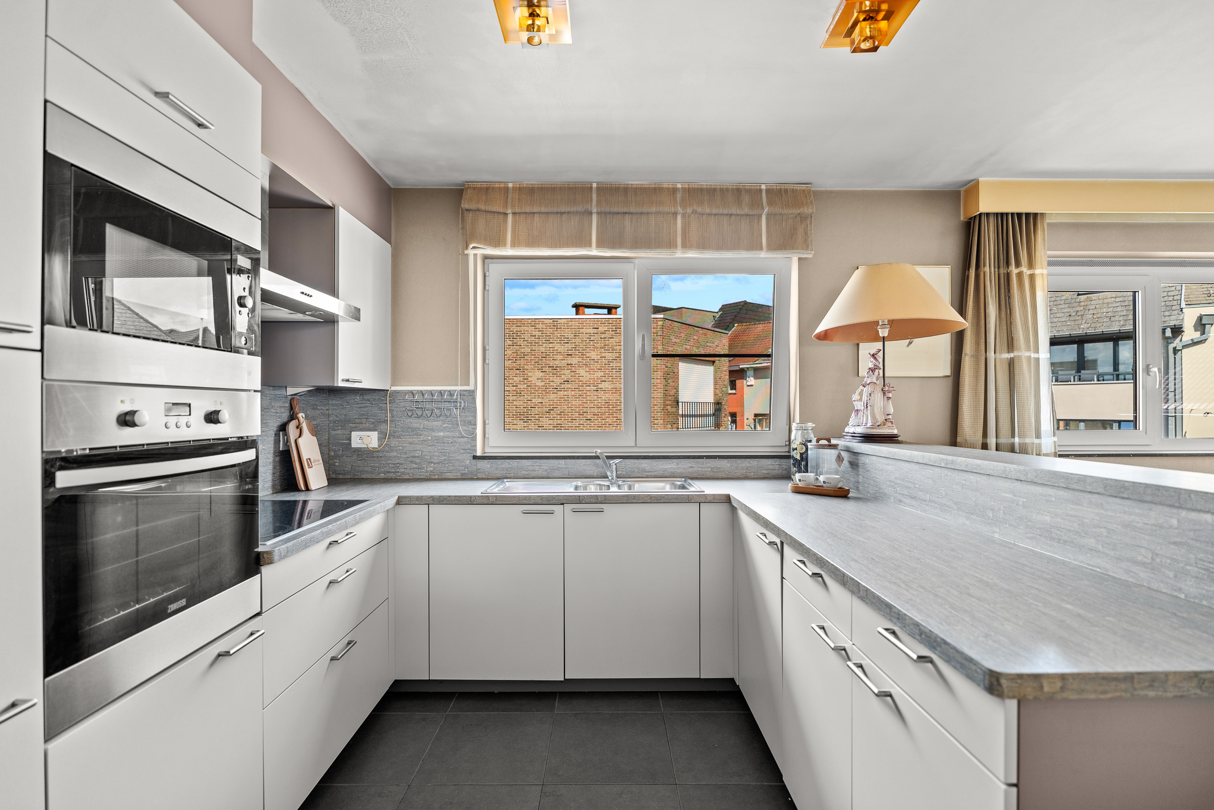Lichtrijk appartement met terras op toplocatie in Wetteren - foto 4