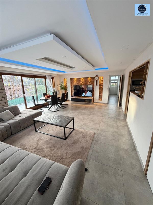 WONING MET HANDELSRUIMTE EN 3 SLAAPKAMERS - foto 3