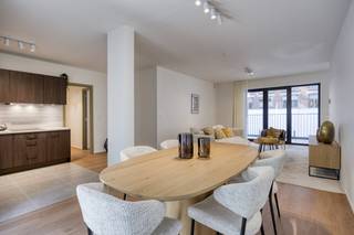 6% of VAT on the whole construction possible! UniQ combines the charm of the historic city center with the comfort of modern architecture. Located on the Hooikaai, this unique project offers 28 high-quality apartments.Why choose UniQ?- Centrally located: Surrounded by Brussels' cultural and culinary hotspots, with excellent public transport links and plenty of shops nearby.- Sustainable living: With excellent energy efficiency (A or B+ score), you can enjoy low energy costs and a green lifestyle.- Premium comfort: Each apartment is equipped with advanced insulation, contemporary finishes and thoughtful layouts that provide a sense of space and light.- Parking facilities: Spacious underground parking spaces and private cellars for your convenience.- Green environment: Relax in the communal garden and enjoy urban biodiversity.Compose your dream home with a wide range of options for finishes, floors and kitchen appliances. Enjoy large windows, modern balconies, and sweeping views of the city.Let the unique atmosphere of Brussels enrich your daily life and become part of a community that redefines modern living.Choose UniQ and discover what it means to live in a stylish, central and sustainable way. Contact our agents for a personal tour.UniQ: Your unique opportunity for exceptional living.