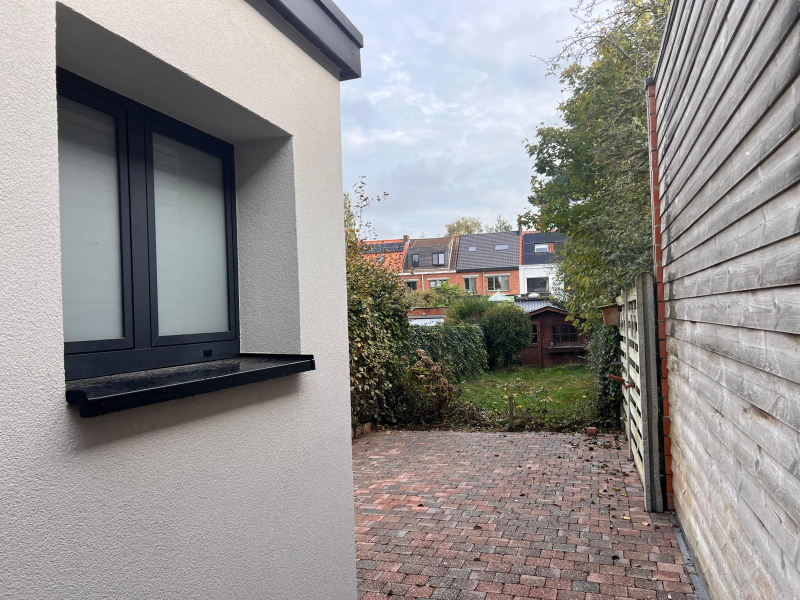Gezellige, centraal gelegen rijwoning met zonnige tuin en 2 slaapkamers - foto 4