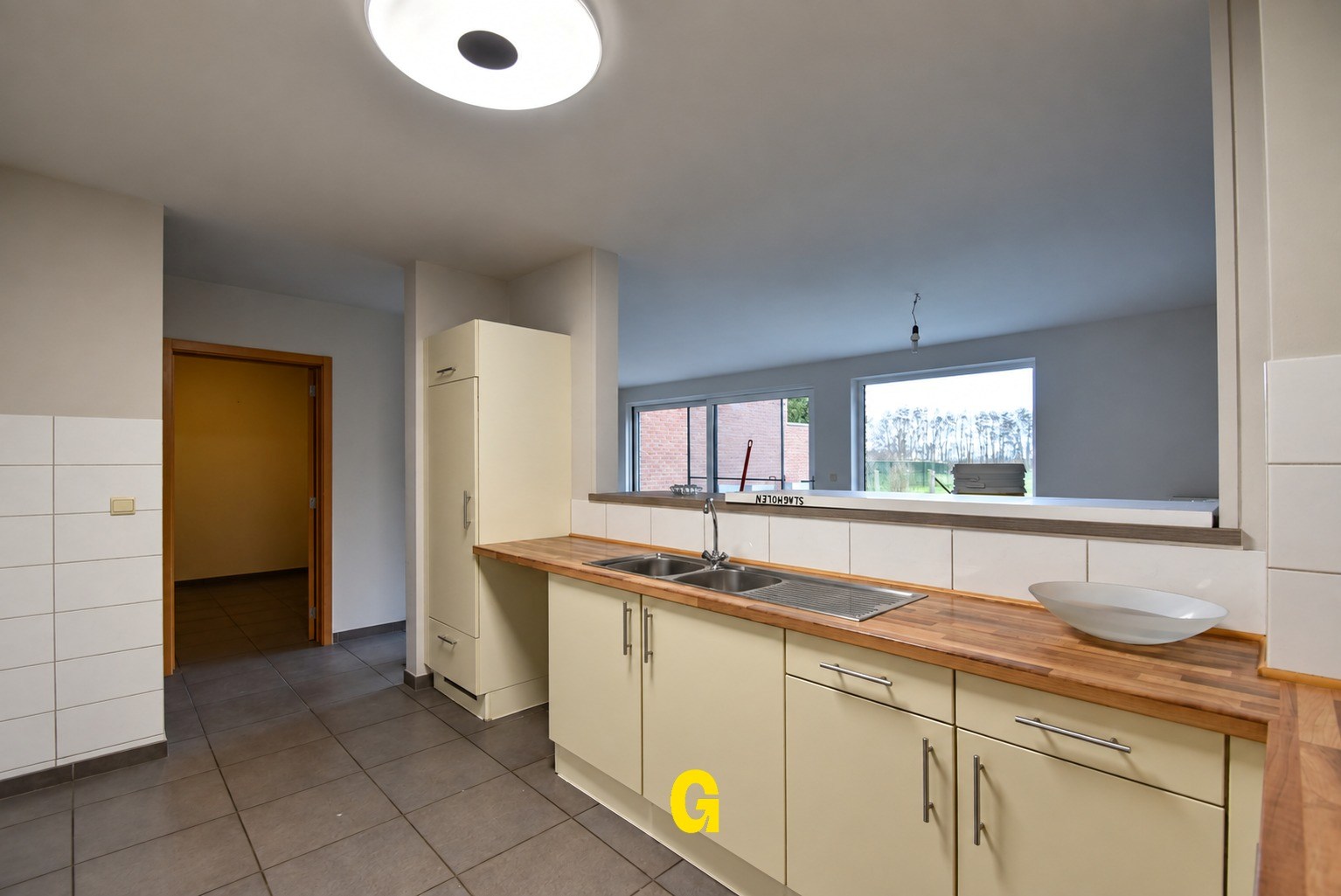 Ruim en degelijk gelijkvloersappartement met groot terras en tuintje - foto 2